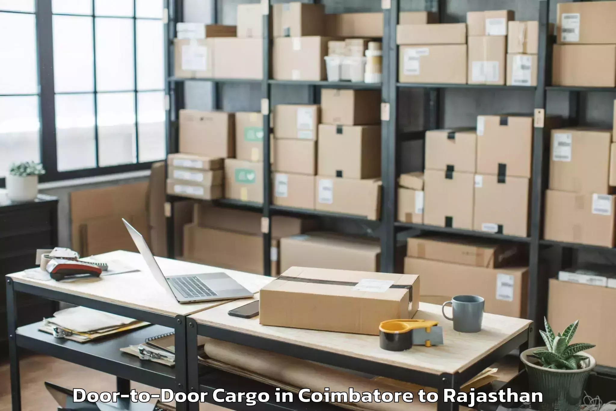 Reliable Coimbatore to Banswara Door To Door Cargo